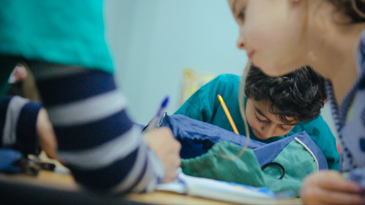 young children doing a craft