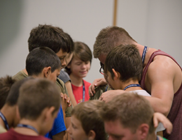 Man talking with small children